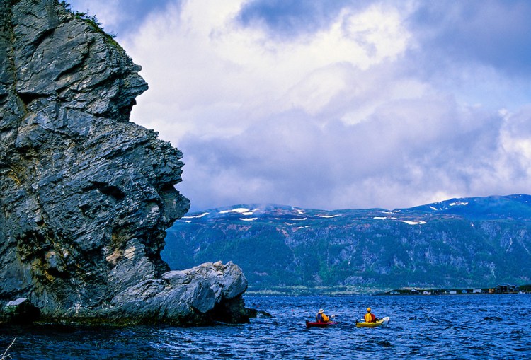 Sea kayaking on Bonne Bay, near Norris Point, Gros Morne National Park, west coast of Newfoundland, Canada